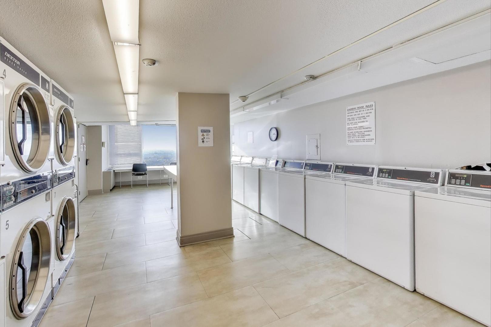 2728 North Hampden Court, Unit 1310 Chicago, IL 60614 - Photo 12 of 15 a view of a storage & utility room with sink dryer and washer