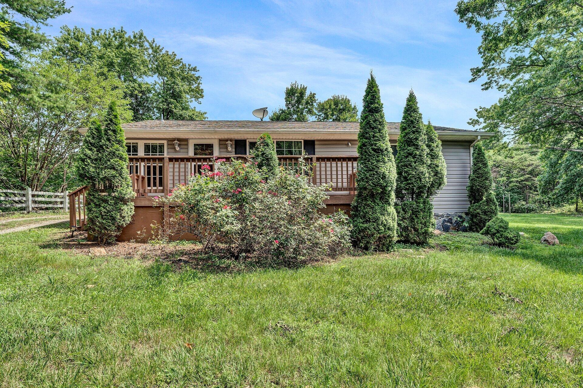 8342 Goodview Road Goodview, VA 24095 - Photo 2 of 30 front view of a house with a yard