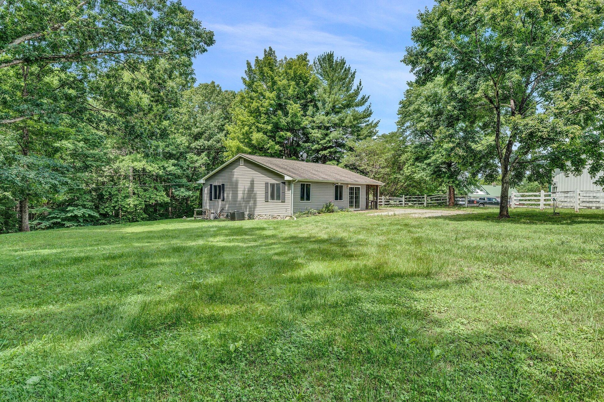 8342 Goodview Road Goodview, VA 24095 - Photo 29 of 30 a house view with a garden space