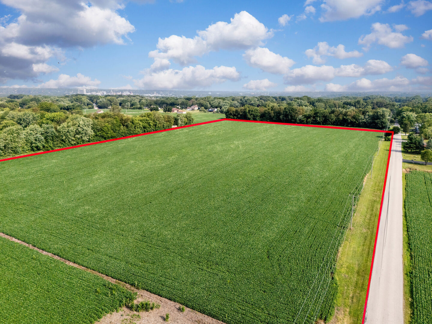 0 Hermans Lane Joliet, IL 60433 - Photo 13 of 18 a view of a lake with a big yard and potted plants