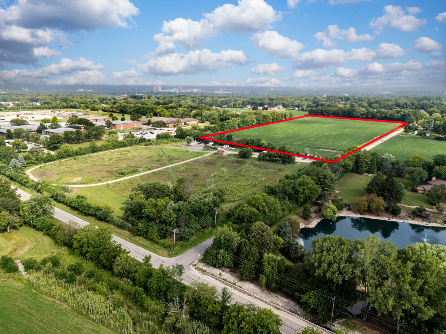 0 Hermans Lane Joliet, IL 60433 - Photo 2 of 18 an aerial view of a residential houses with outdoor space and trees