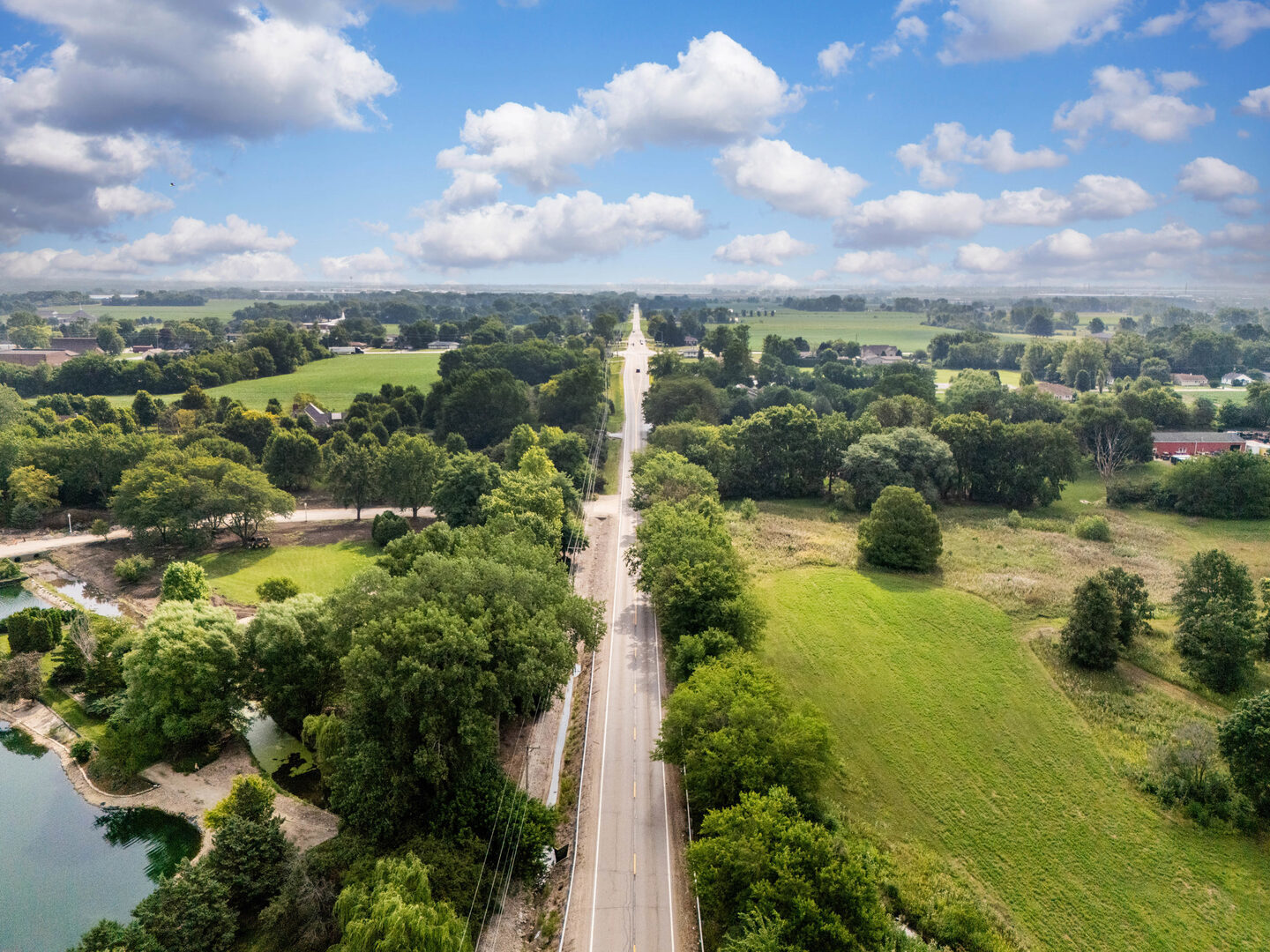 0 Hermans Lane Joliet, IL 60433 - Photo 6 of 18 an aerial view of residential houses with outdoor space and trees