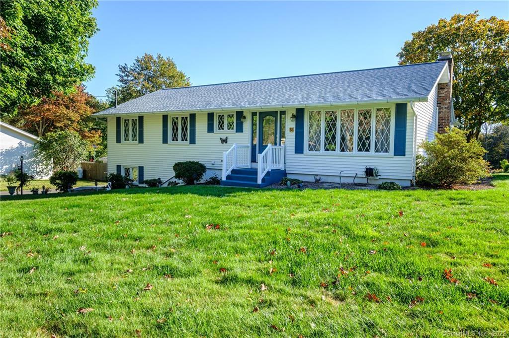 8 Juggernaut Road Prospect, CT 06712 - Photo 1 of 1 a front view of a house with garden