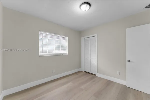 an empty room with a window