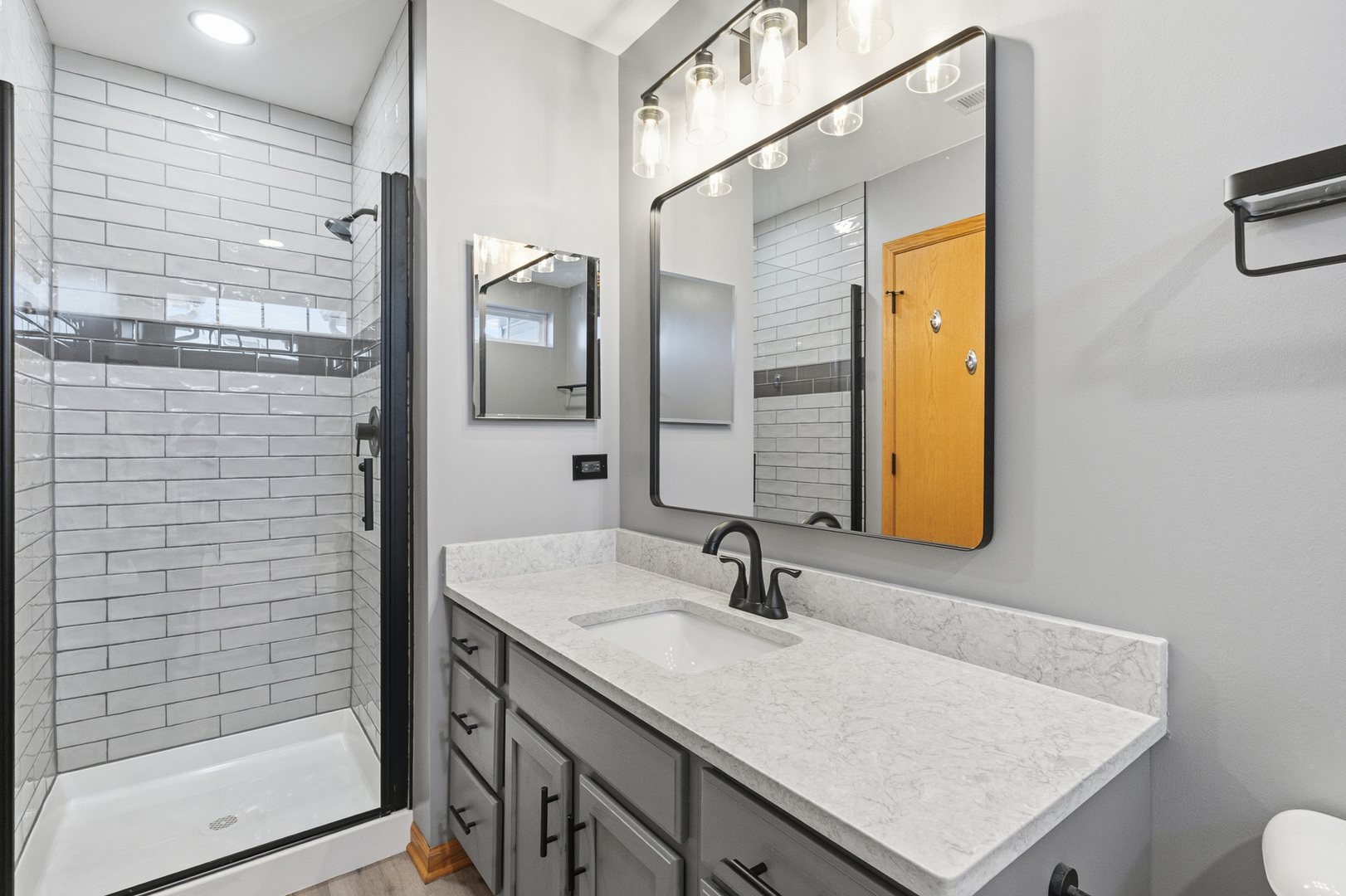 17656 Gilbert Drive Lockport, IL 60441 - Photo 11 of 32 a bathroom with a sink a toilet and shower