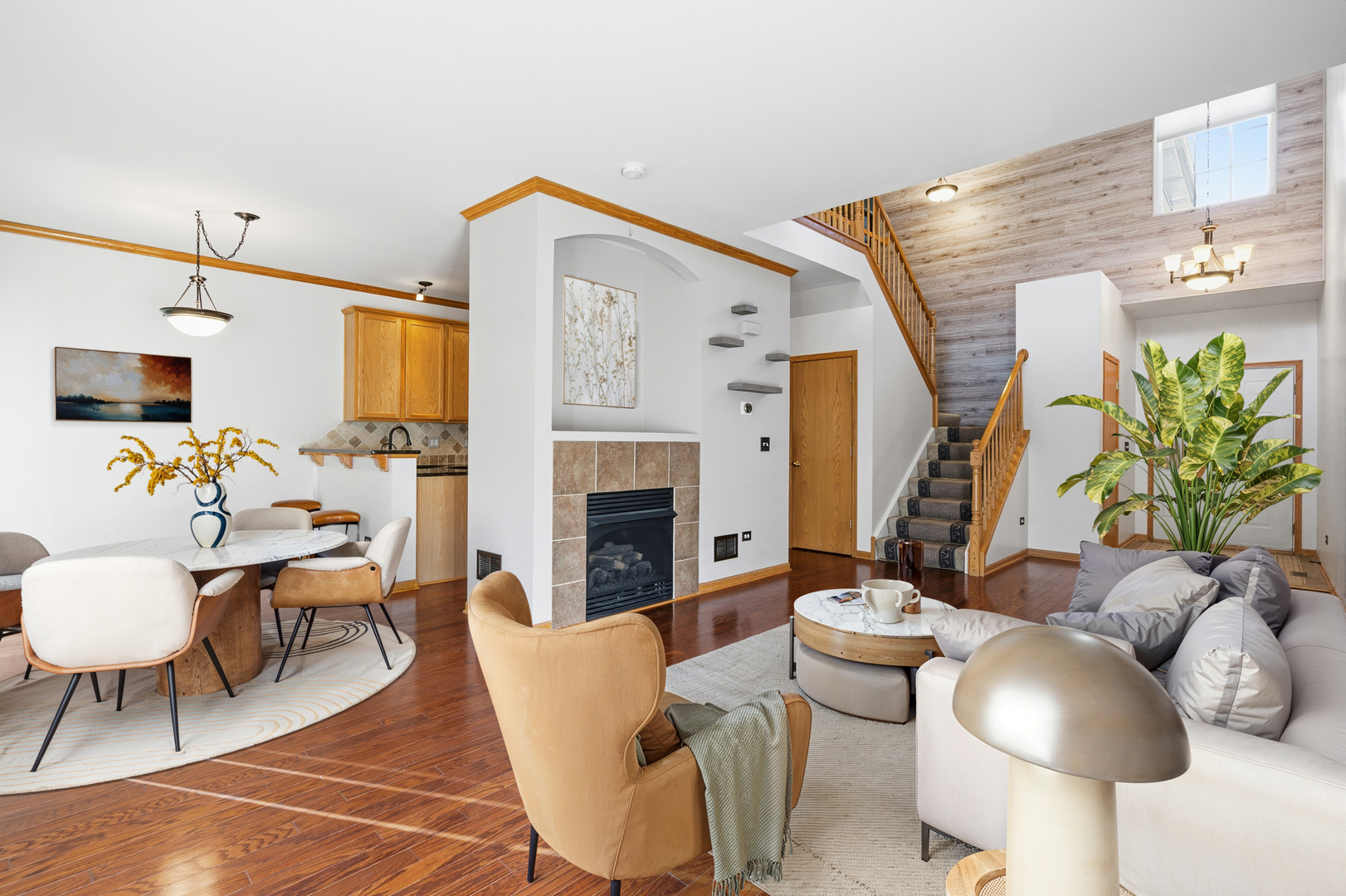 17656 Gilbert Drive Lockport, IL 60441 - Photo 2 of 32 a living room with furniture a fireplace and a table