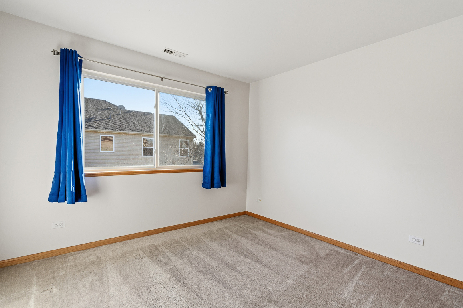 17656 Gilbert Drive Lockport, IL 60441 - Photo 21 of 32 a view of empty room with wooden floor and fan