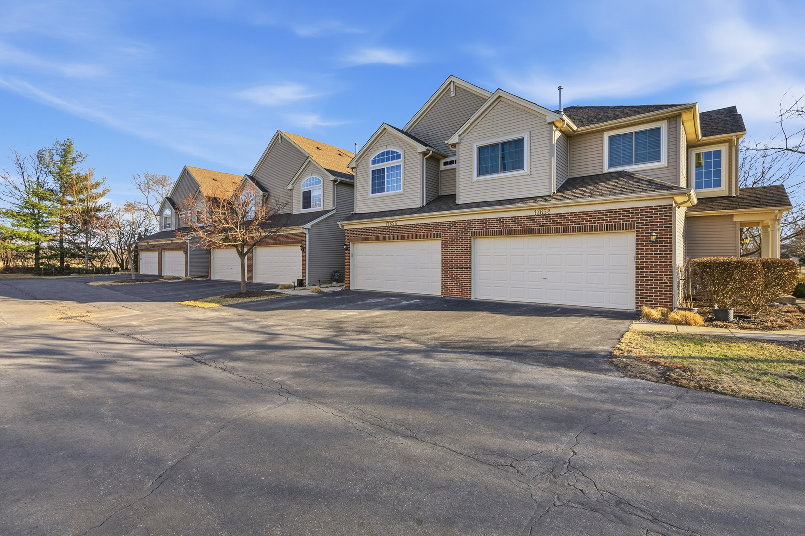 17656 Gilbert Drive Lockport, IL 60441 - Photo 27 of 32 a front view of a house with a yard