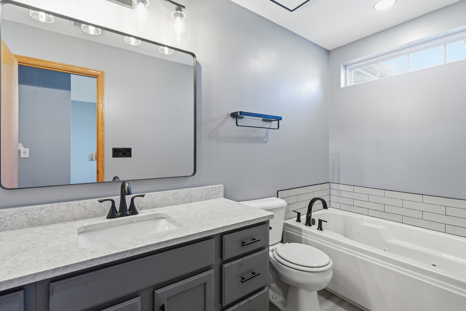17656 Gilbert Drive Lockport, IL 60441 - Photo 10 of 32 a bathroom with a sink and a mirror