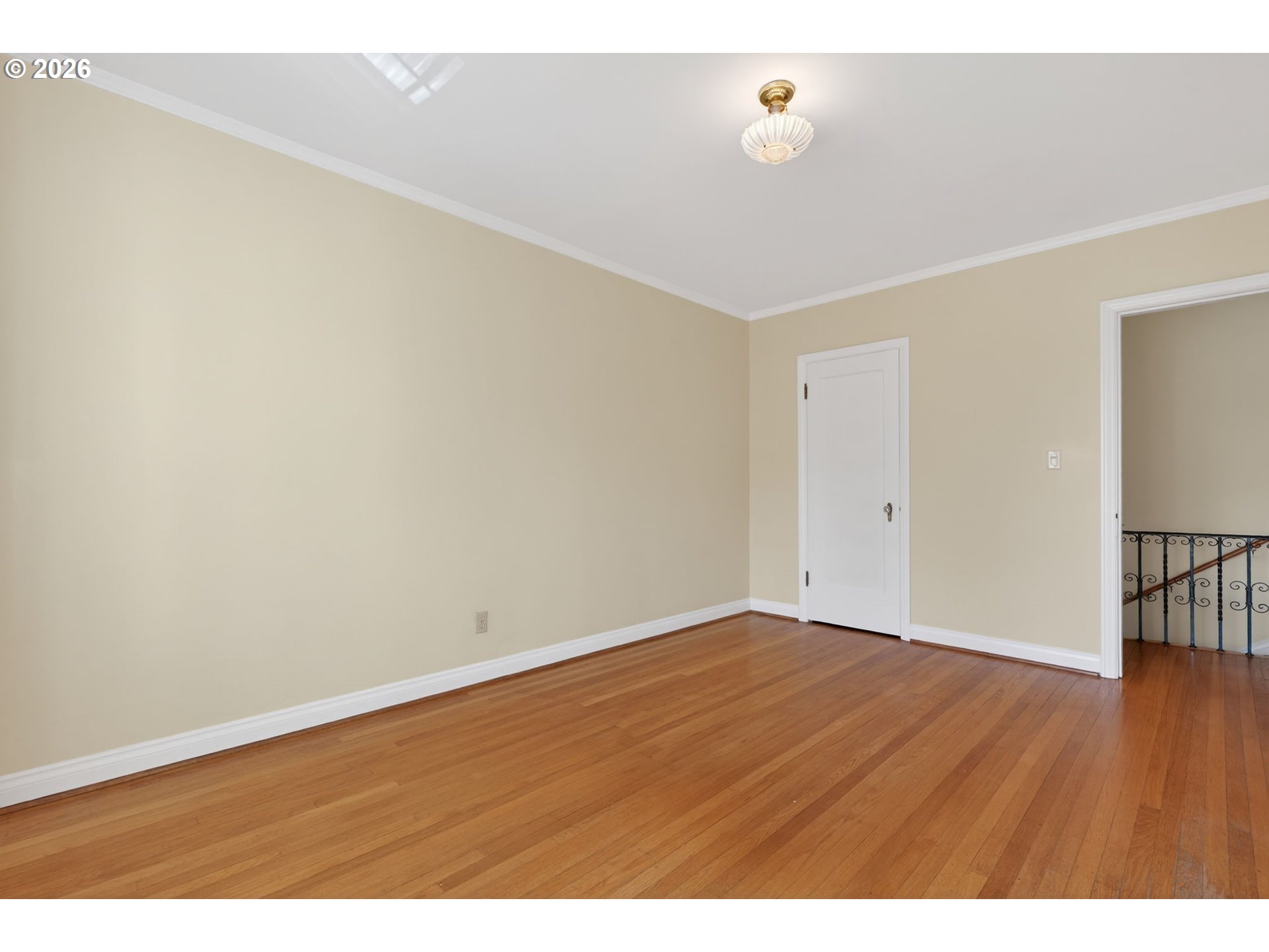 2325 Northeast Flanders Street, Unit 8 Portland, OR 97232 - Photo 17 of 42 a view of an empty room with wooden floor