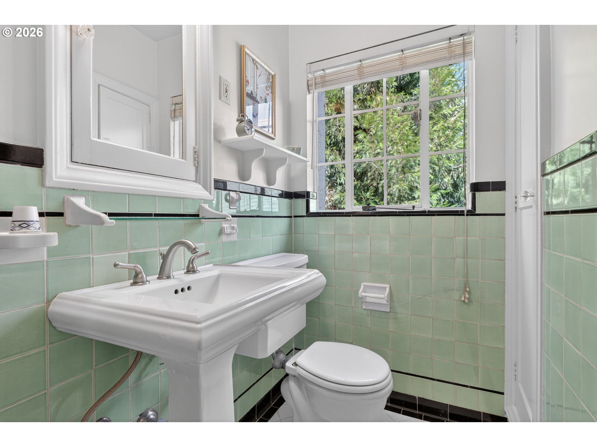 2325 Northeast Flanders Street, Unit 8 Portland, OR 97232 - Photo 20 of 42 a bathroom with a sink toilet and a mirror