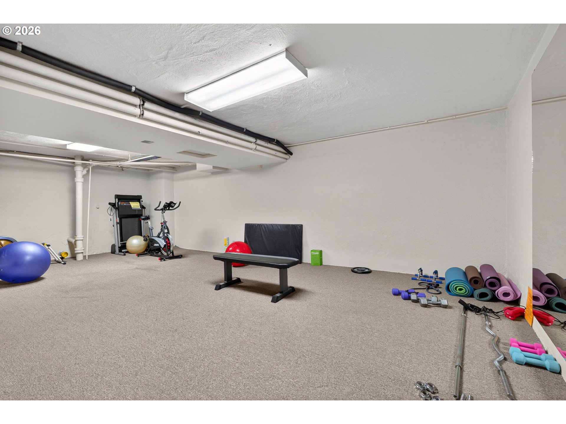 2325 Northeast Flanders Street, Unit 8 Portland, OR 97232 - Photo 26 of 42 a group of people sitting in a room