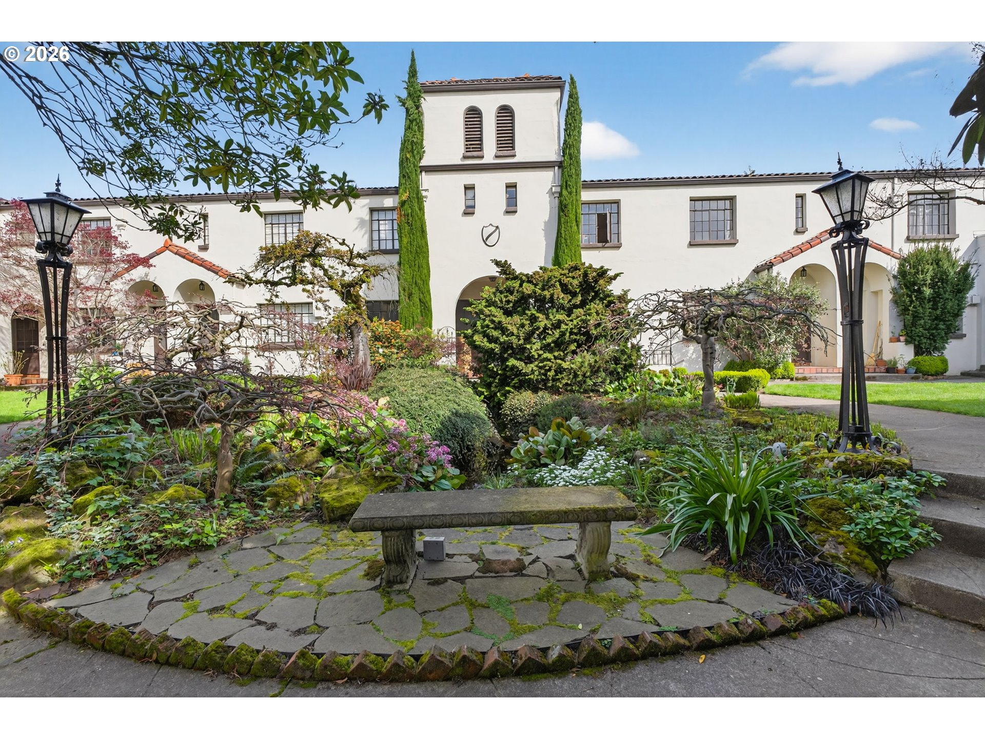 2325 Northeast Flanders Street, Unit 8 Portland, OR 97232 - Photo 3 of 42 a view of a yard in front of house with a fountain