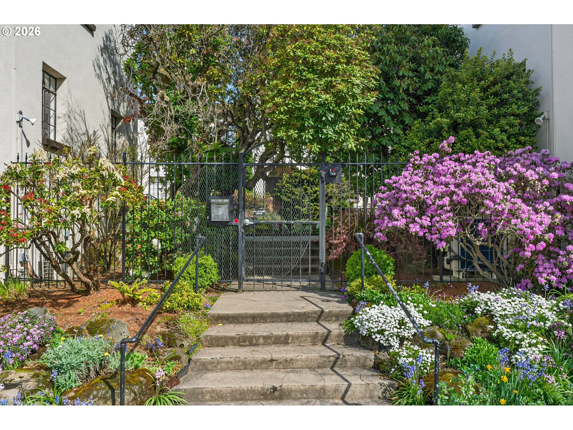 2325 Northeast Flanders Street, Unit 8 Portland, OR 97232 - Photo 36 of 42 a view of a pathway with a garden