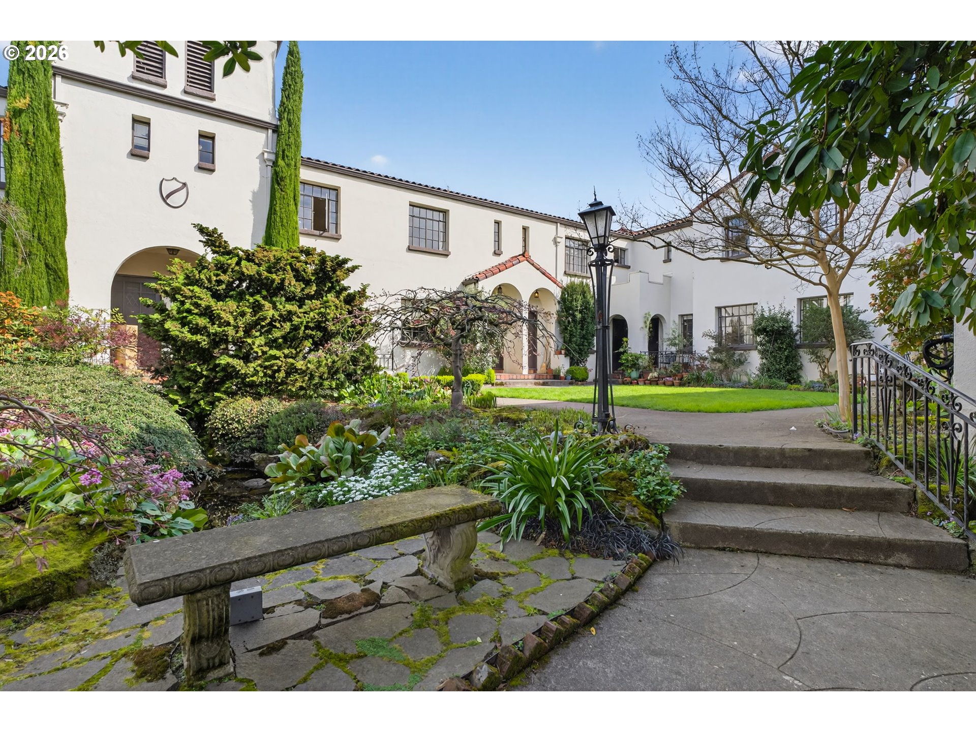 2325 Northeast Flanders Street, Unit 8 Portland, OR 97232 - Photo 38 of 42 a front view of a house with garden
