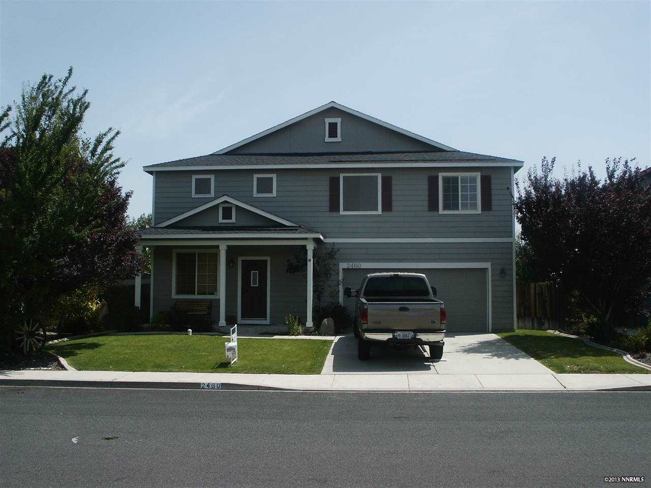 2460 Montego Drive Reno, NV 89523 - Photo 1 of 1 a view of a big house with a yard and large trees