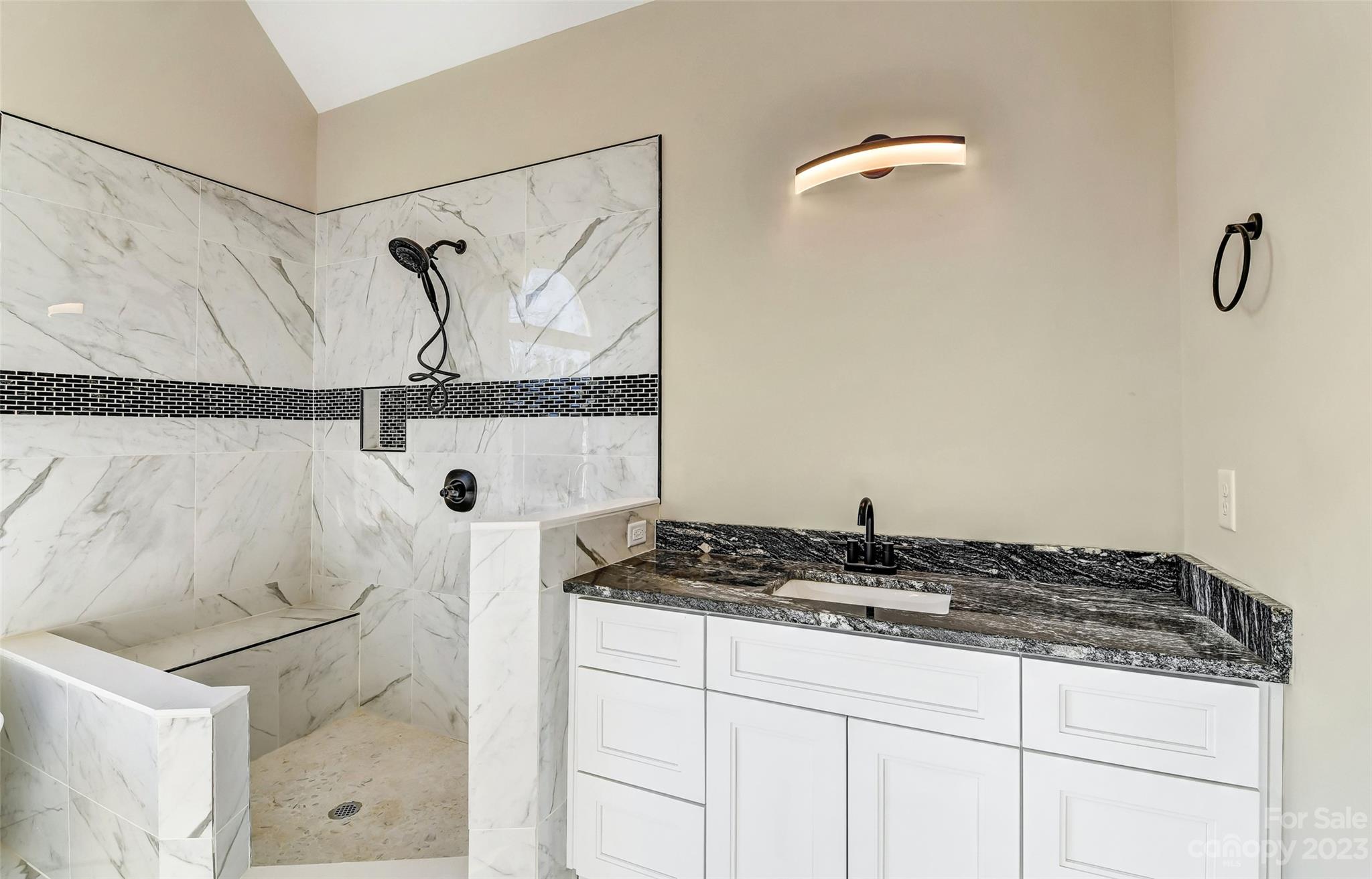 4308 White Tail Lane Midland, NC 28107 - Photo 24 of 37 a bathroom with a granite countertop sink and a shower