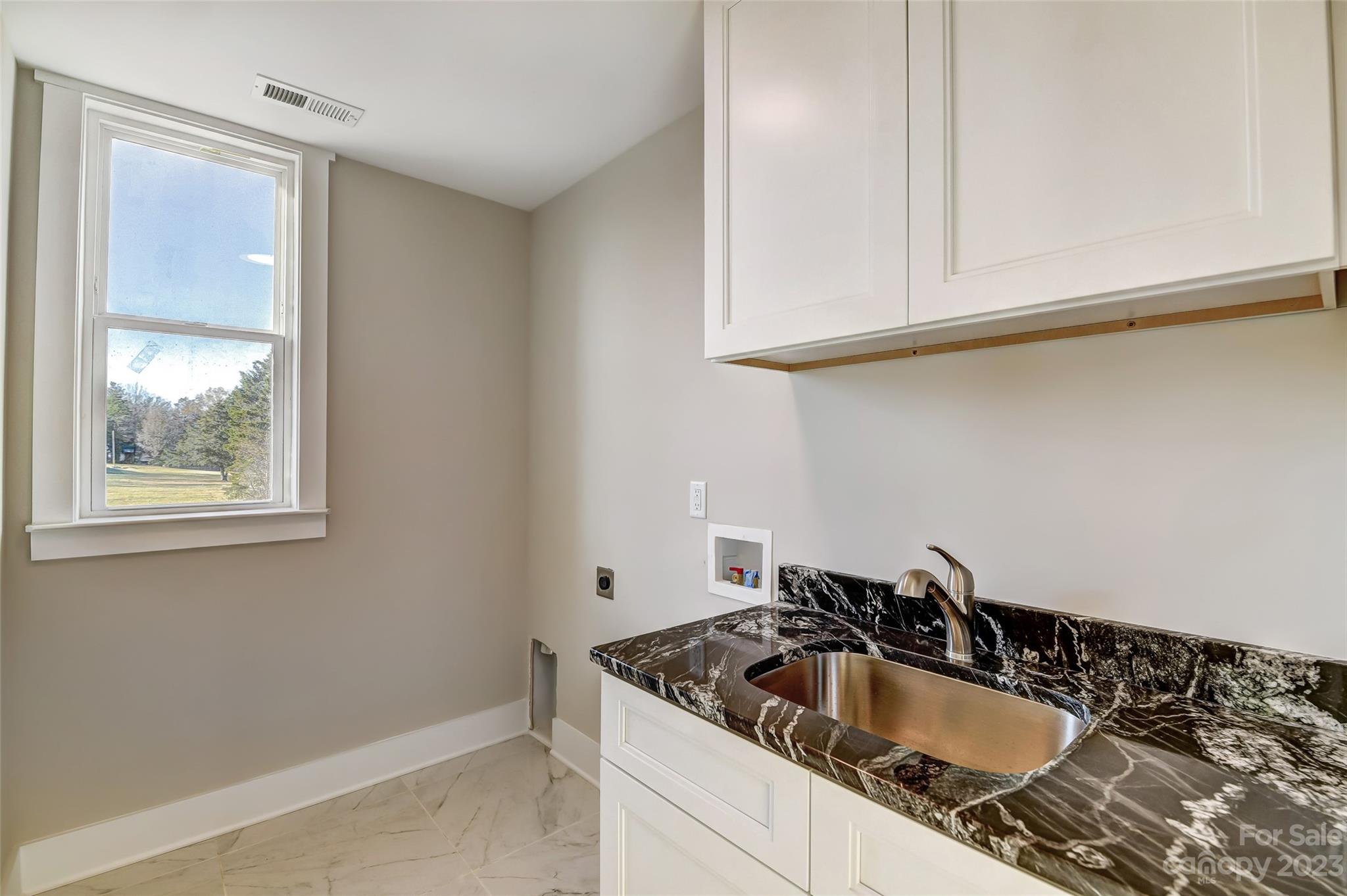4308 White Tail Lane Midland, NC 28107 - Photo 30 of 37 a bathroom with a sink and a window