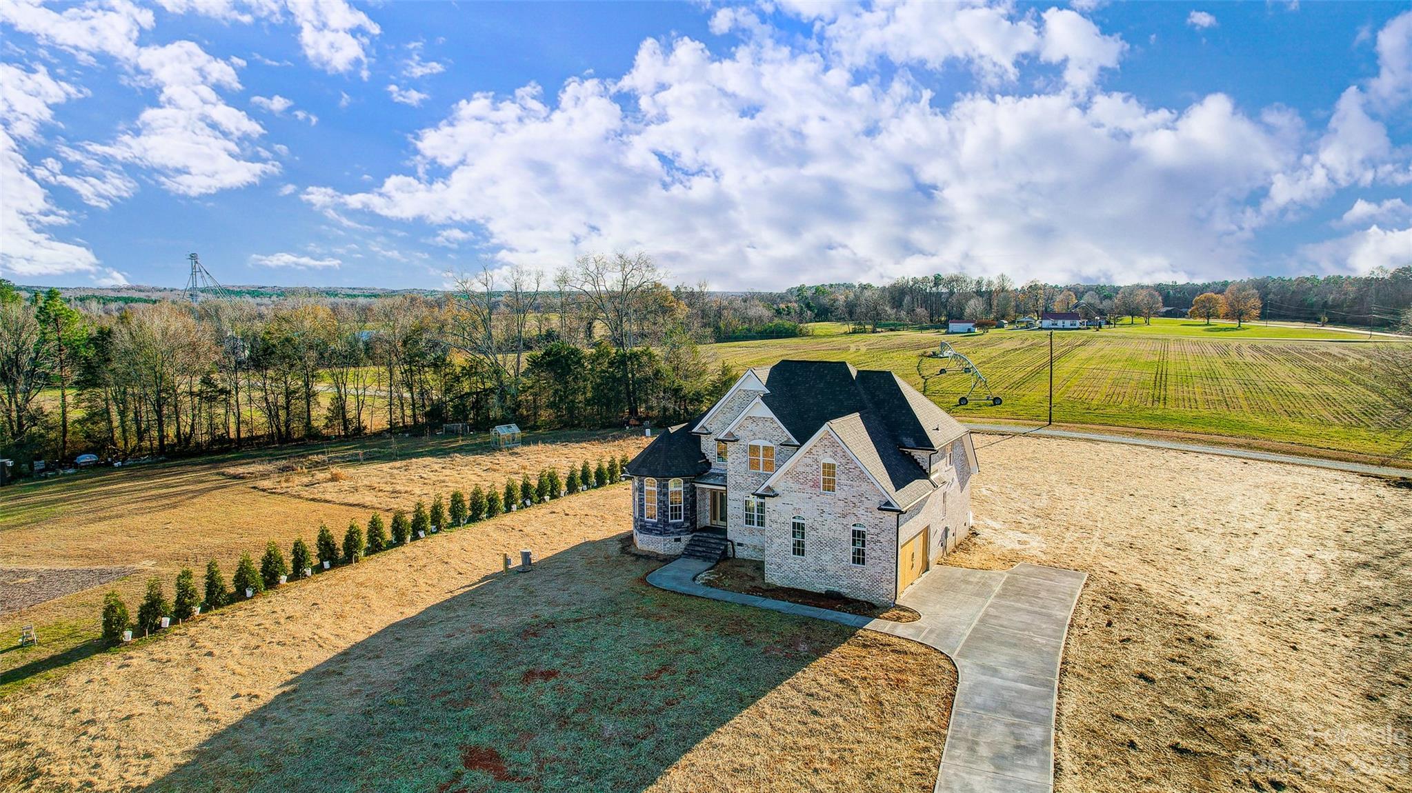 4308 White Tail Lane Midland, NC 28107 - Photo 3 of 37 a view of swimming pool with a garden