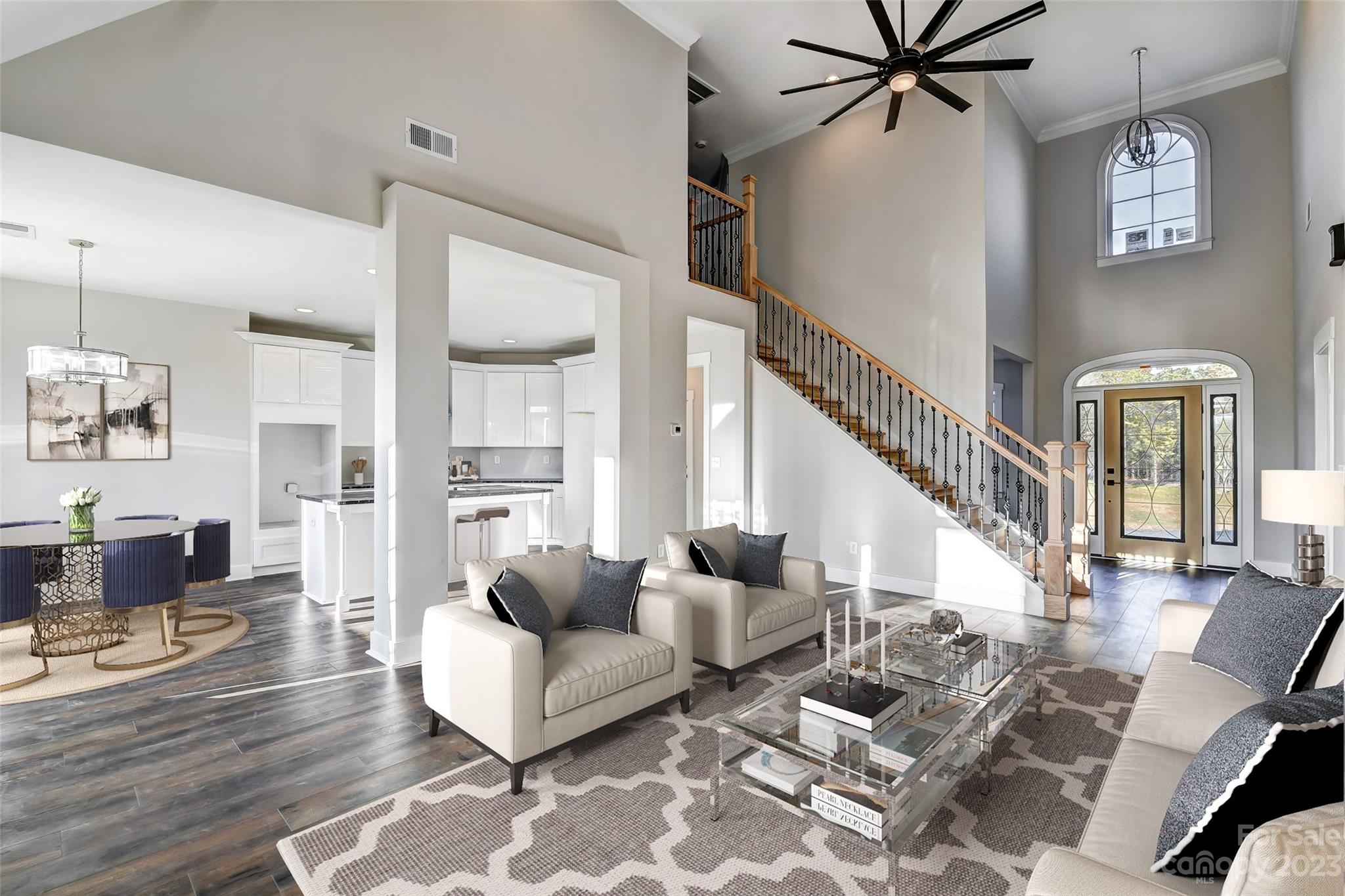4308 White Tail Lane Midland, NC 28107 - Photo 8 of 37 a living room with couches and a potted plant on a coffee table with wooden floor