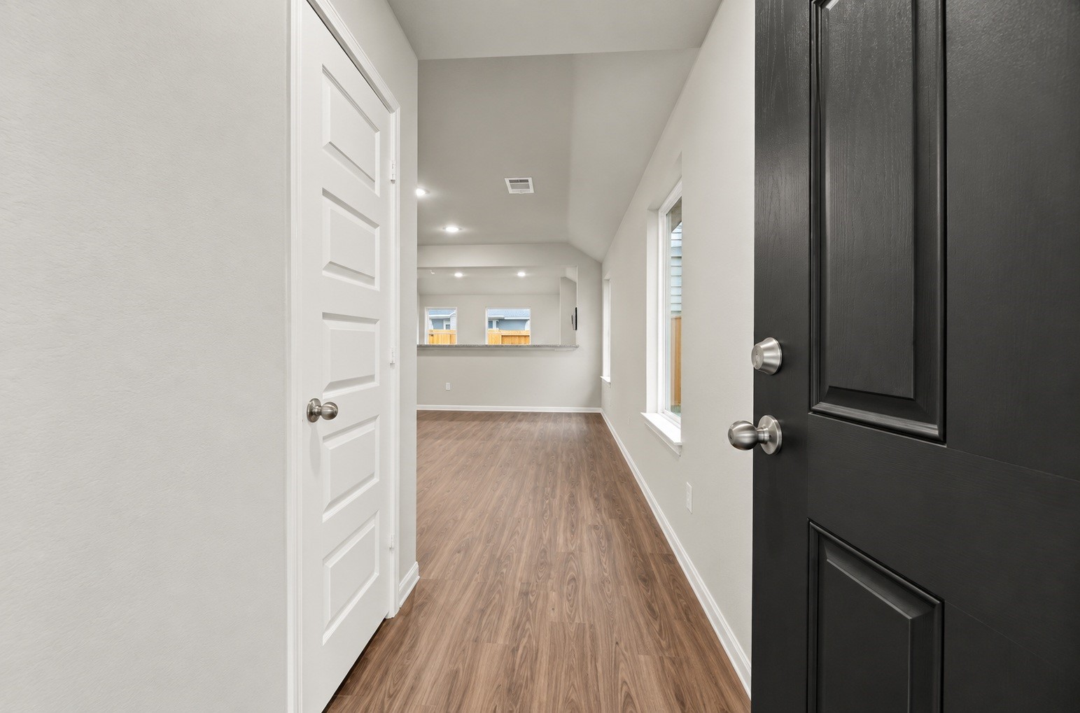 1392 Mount Blanc Path Conroe, TX 77301 - Photo 7 of 20 Main entrance leading to living room - AI Enhanced