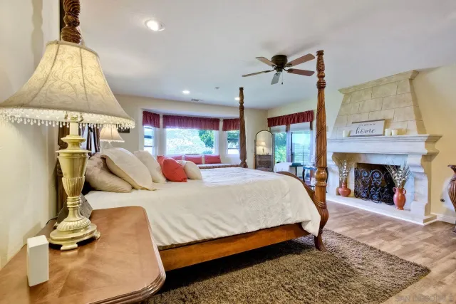 a bedroom with a bed and a couch