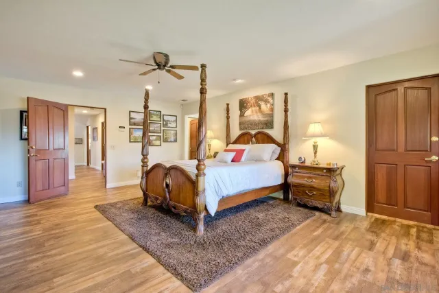 a bathroom with a double vanity sink mirror and