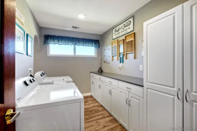 a view of a wooden deck with a bench