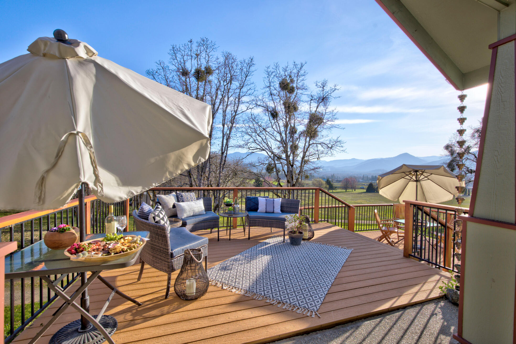 1440 Kubli Road Grants Pass, OR 97527 - Photo 28 of 56 a view of balcony with wooden floor and outdoor seating