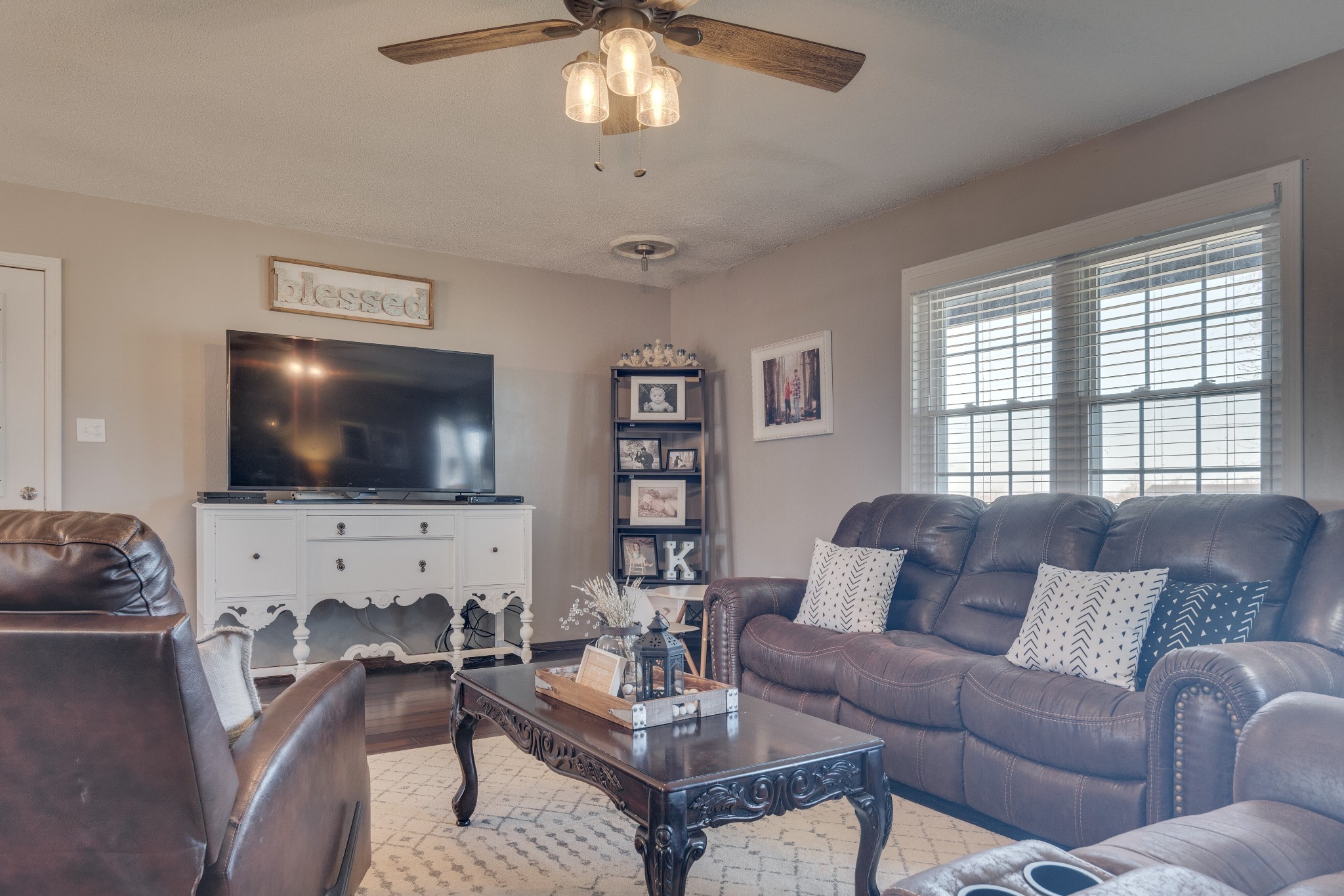 403 Mockingbird Drive Mount Pleasant, TN 38474 - Photo 11 of 26 a living room with furniture and a flat screen tv
