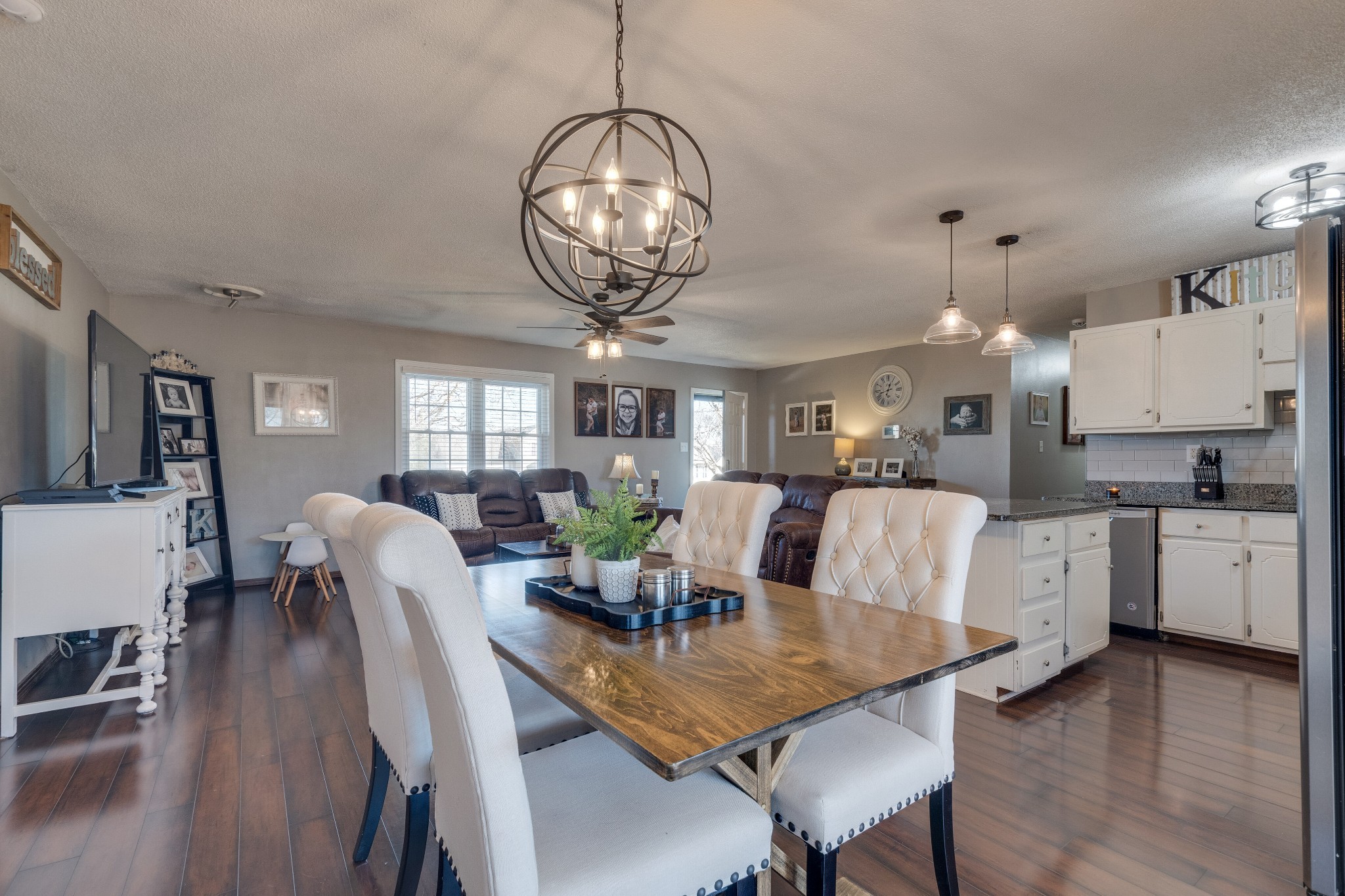 403 Mockingbird Drive Mount Pleasant, TN 38474 - Photo 12 of 26 a view of a dining room with furniture wooden floor and chandelier