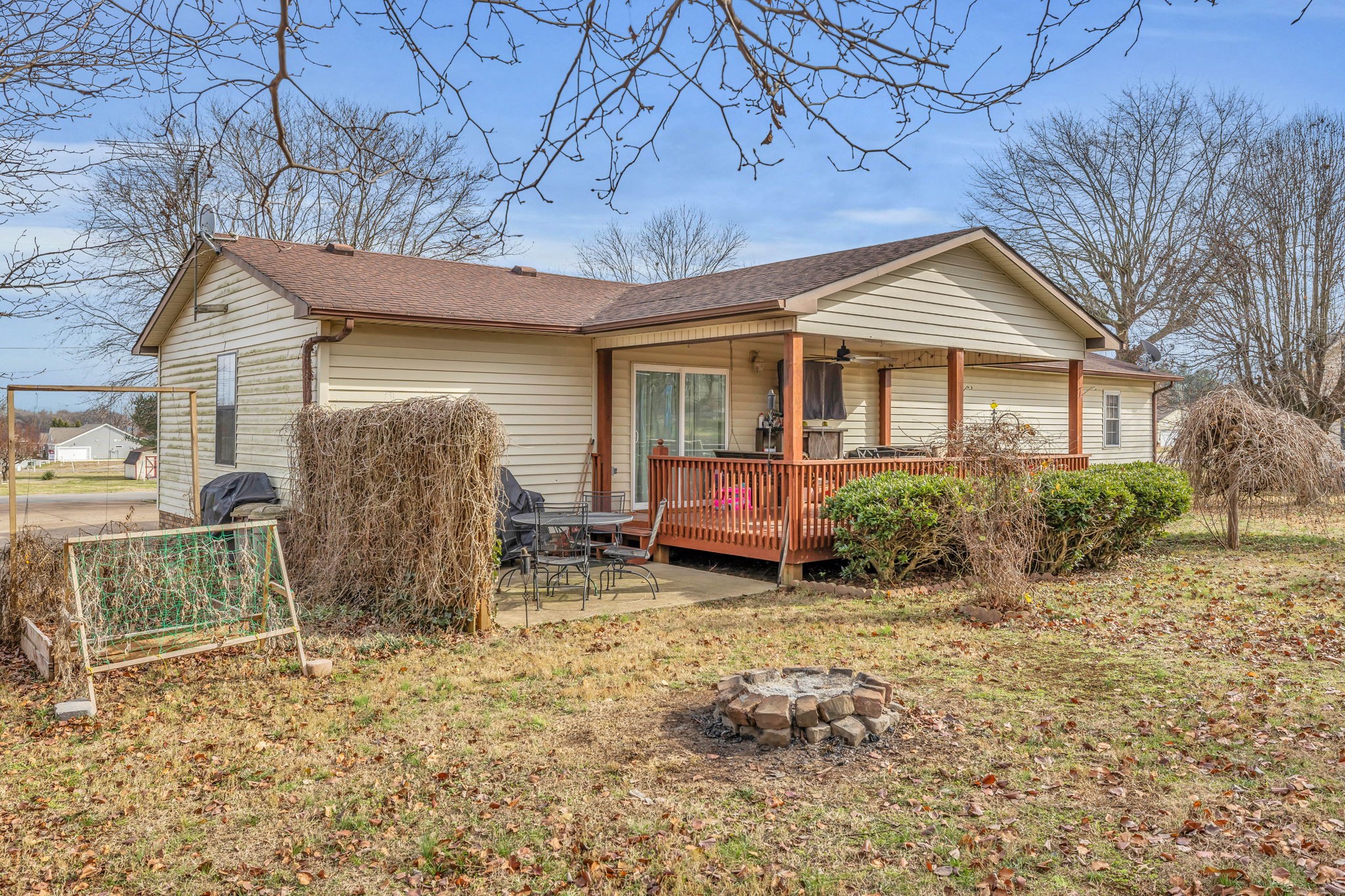 403 Mockingbird Drive Mount Pleasant, TN 38474 - Photo 24 of 26 a view of a house with backyard and sitting area
