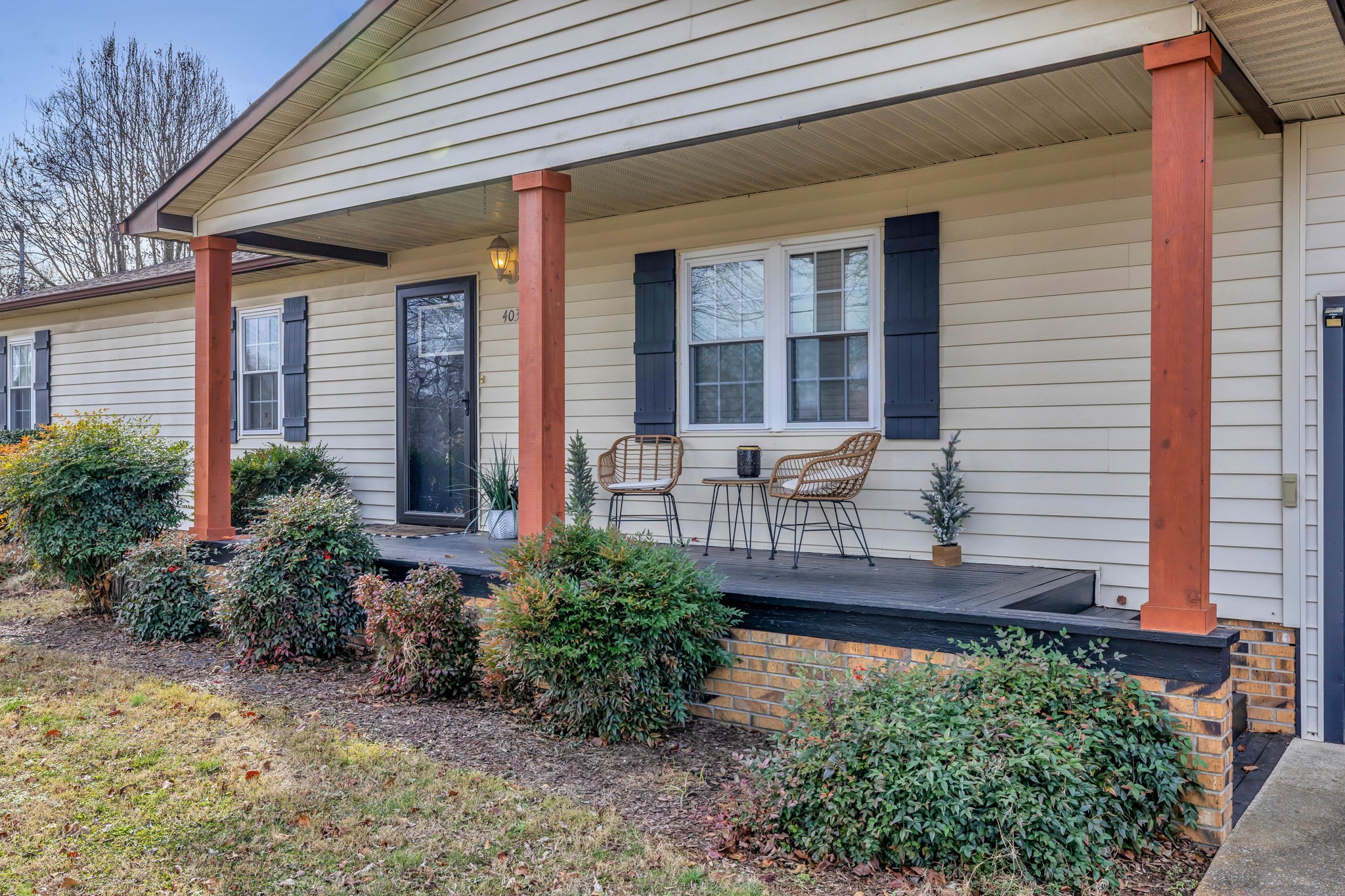 403 Mockingbird Drive Mount Pleasant, TN 38474 - Photo 5 of 26 a front view of house with yard outdoor seating and barbeque oven