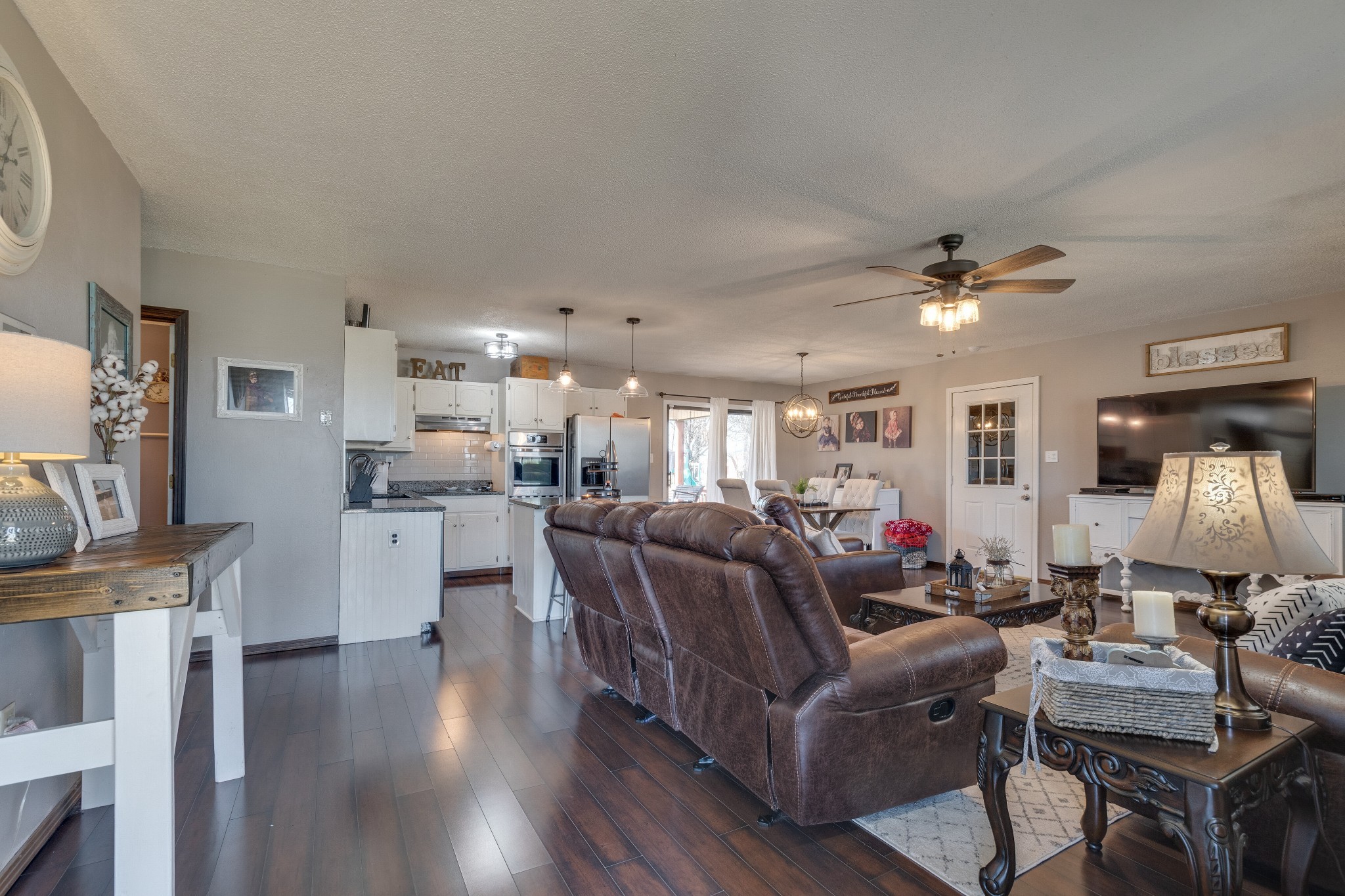 403 Mockingbird Drive Mount Pleasant, TN 38474 - Photo 8 of 26 a living room with furniture kitchen view and a wooden floor