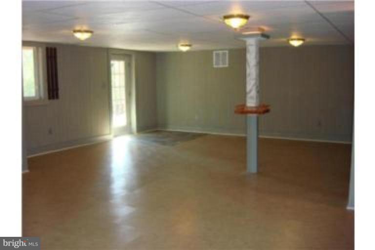 3511 Patuxent Road Huntingtown, MD 20639 - Photo 14 of 23 lower level recreation room