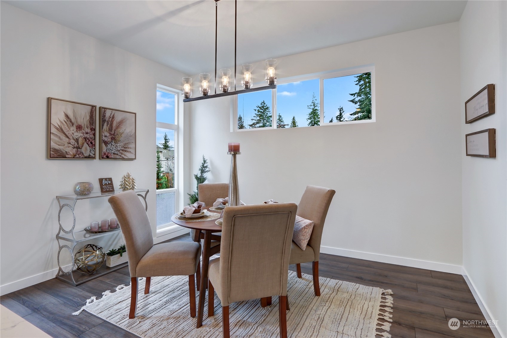 2527 Gibson Road, Unit A5 Everett, WA 98204 - Photo 8 of 21 a view of a dining room with furniture wooden floor and chandelier