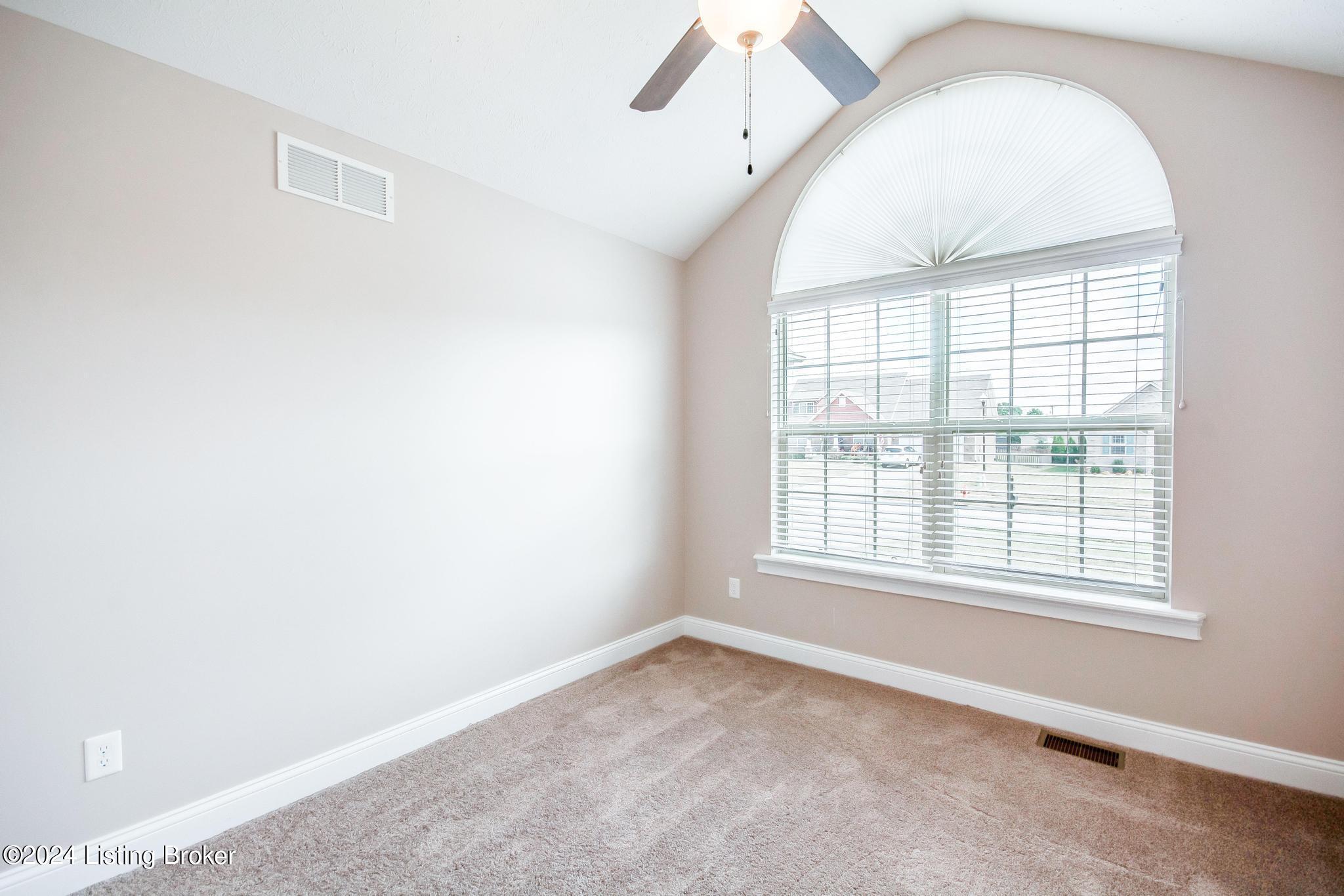 283 Autumn Ridge Drive Mount Washington, KY 40047 - Photo 19 of 41 Bedroom #2 with new carpeting, vaulted ceiling, new ceiling fan/light fixture, double window with arched transom above, fresh coat of paint and access to Full Bath #2.