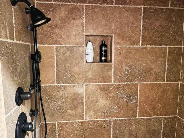a view of living room with furniture and wooden floor