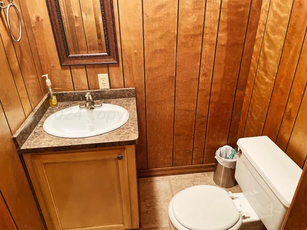 a view of swimming pool with outdoor seating and a yard