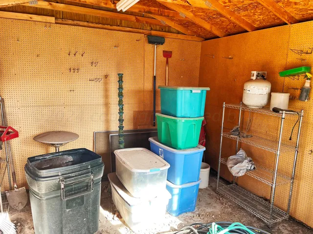 a view of barbeque area with fireplace