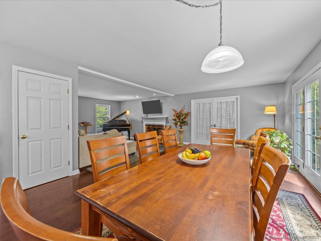 30 Renees Way Madison, CT 06443 - Photo 12 of 40 a view of a dining room with furniture window and wooden floor