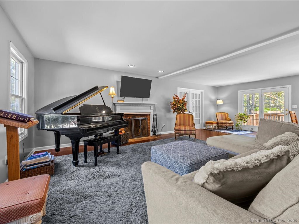 30 Renees Way Madison, CT 06443 - Photo 17 of 40 a living room with furniture and a piano