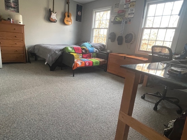 30 Renees Way Madison, CT 06443 - Photo 35 of 40 a bedroom with a bed and a window