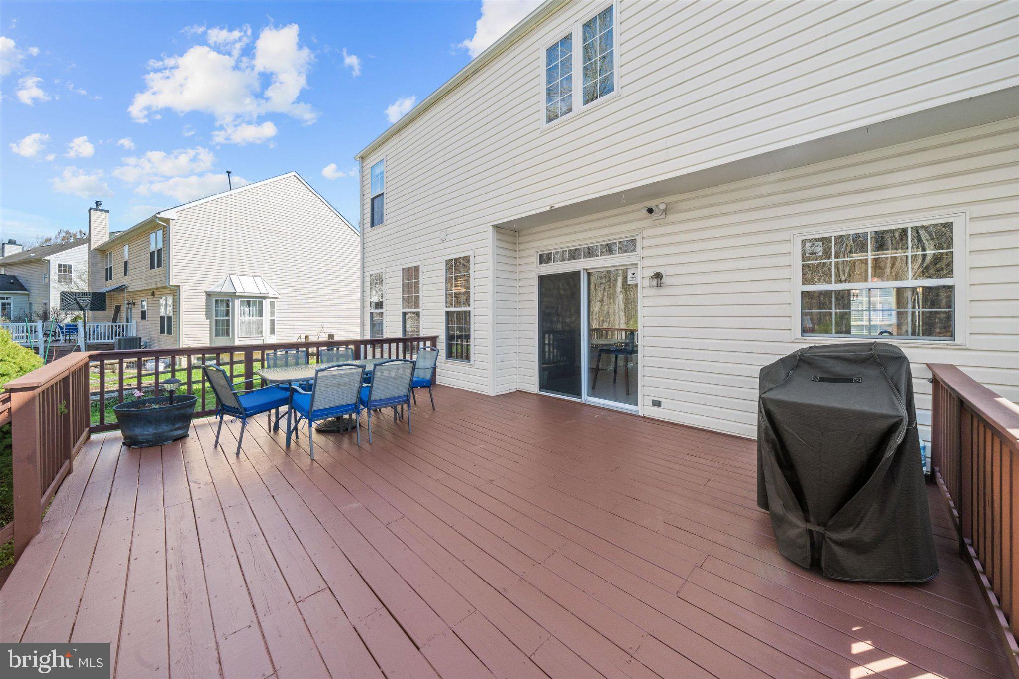 457 Preakness Run Newark, DE 19702 - Photo 17 of 55 a view of a roof deck with table and chairs and wooden floor