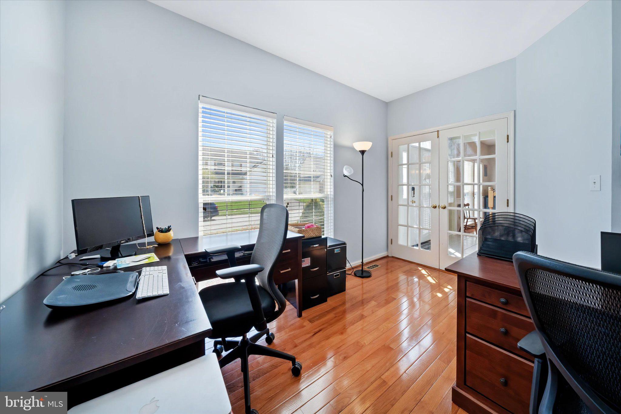 457 Preakness Run Newark, DE 19702 - Photo 24 of 55 a view of a workspace with furniture and a window