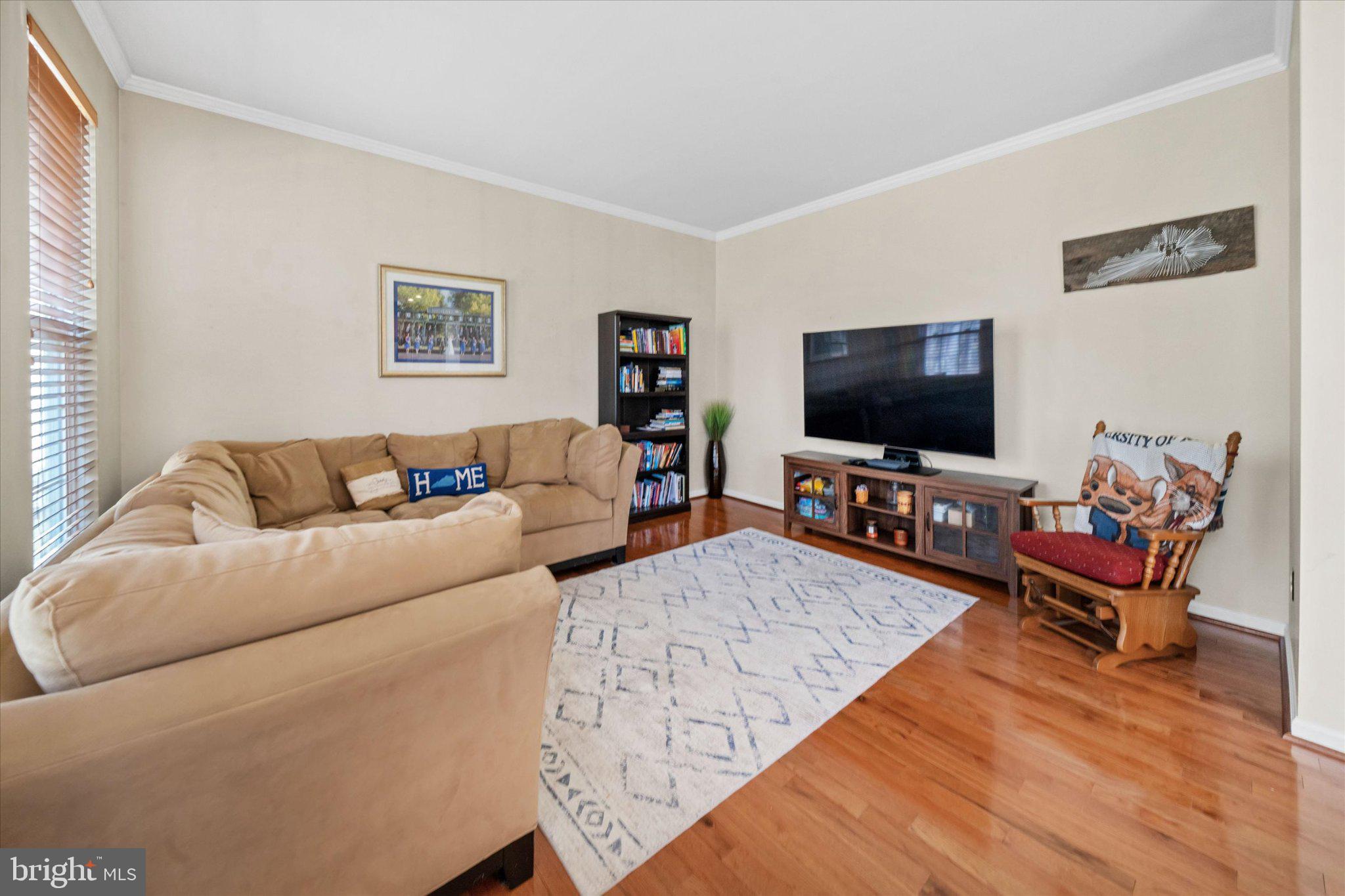 457 Preakness Run Newark, DE 19702 - Photo 26 of 55 a living room with furniture and a flat screen tv