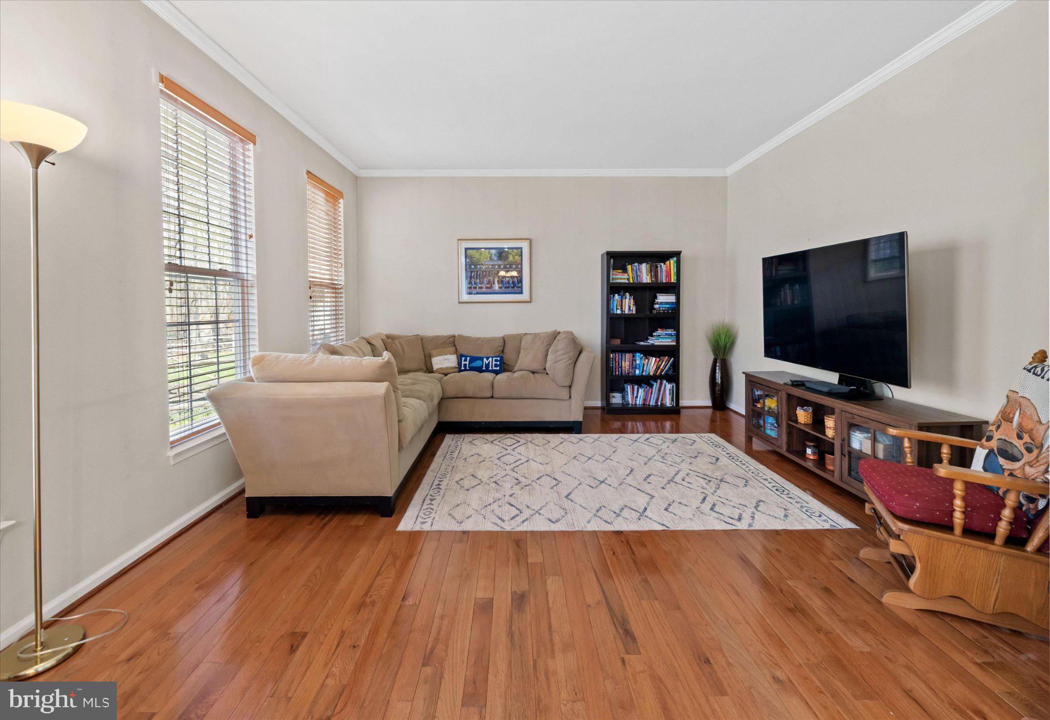 457 Preakness Run Newark, DE 19702 - Photo 27 of 55 a living room with furniture and a flat screen tv