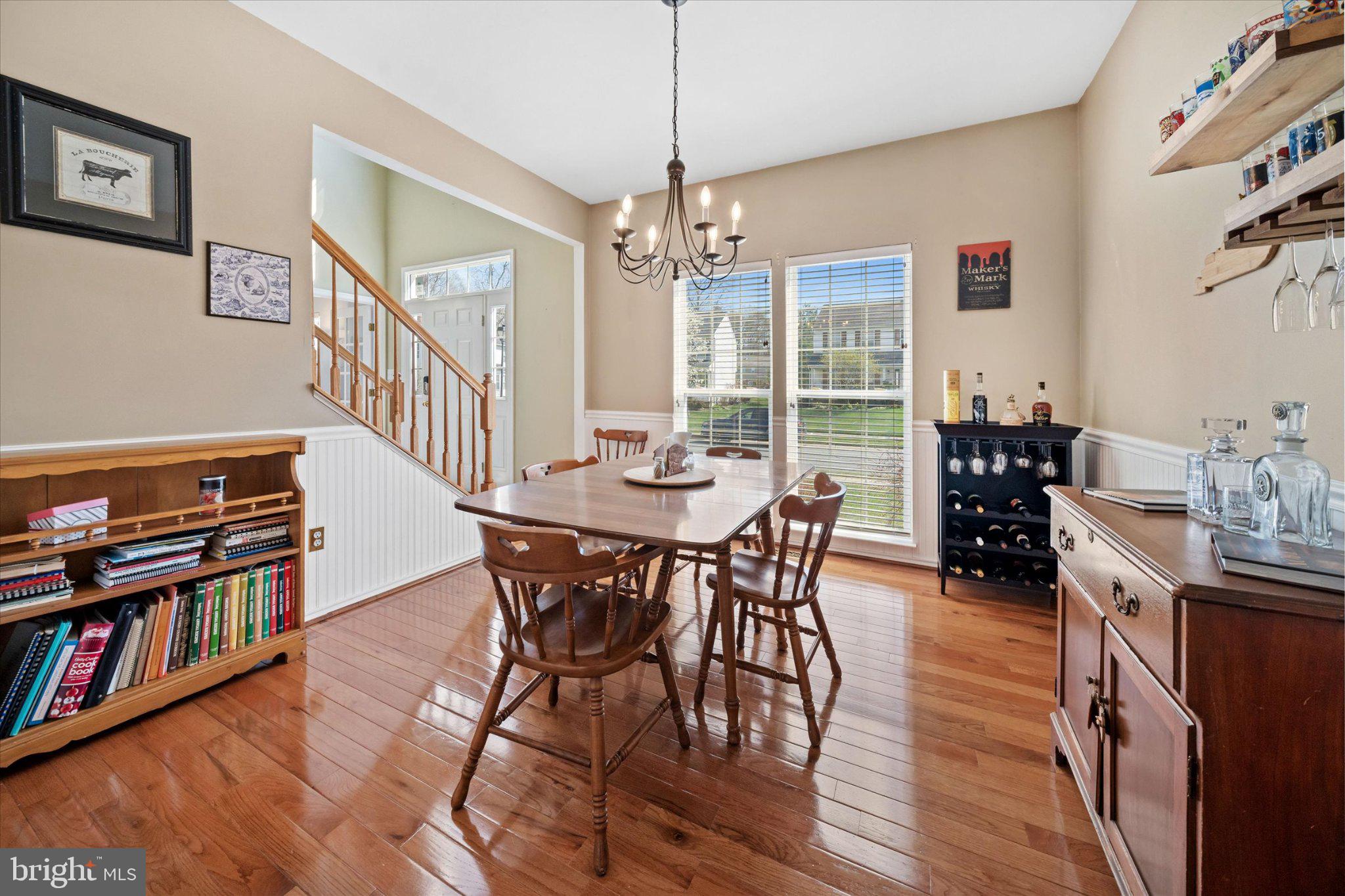 457 Preakness Run Newark, DE 19702 - Photo 29 of 55 a view of a dining room with furniture and wooden floor