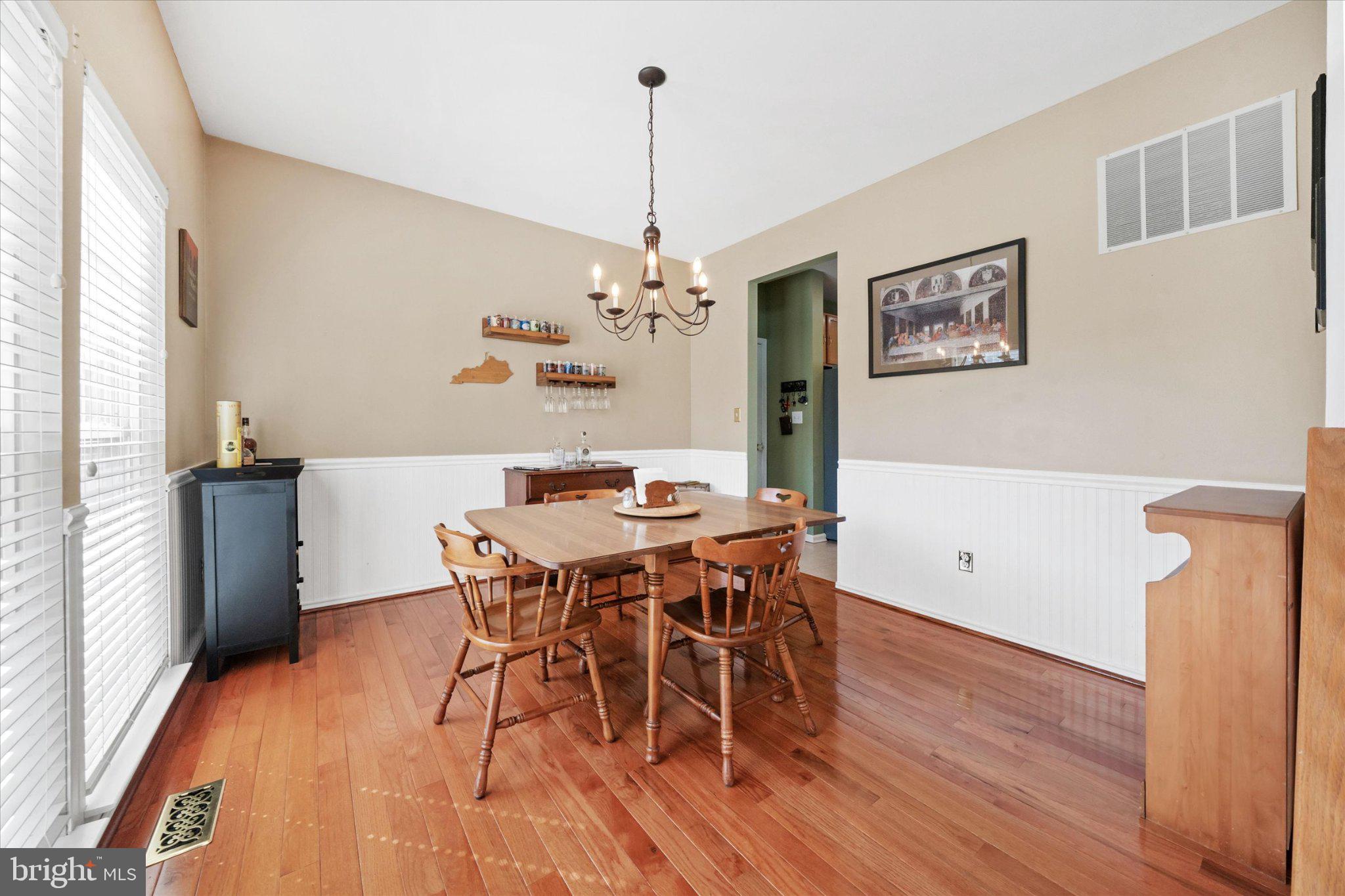 457 Preakness Run Newark, DE 19702 - Photo 30 of 55 a view of a dining room with furniture window and wooden floor