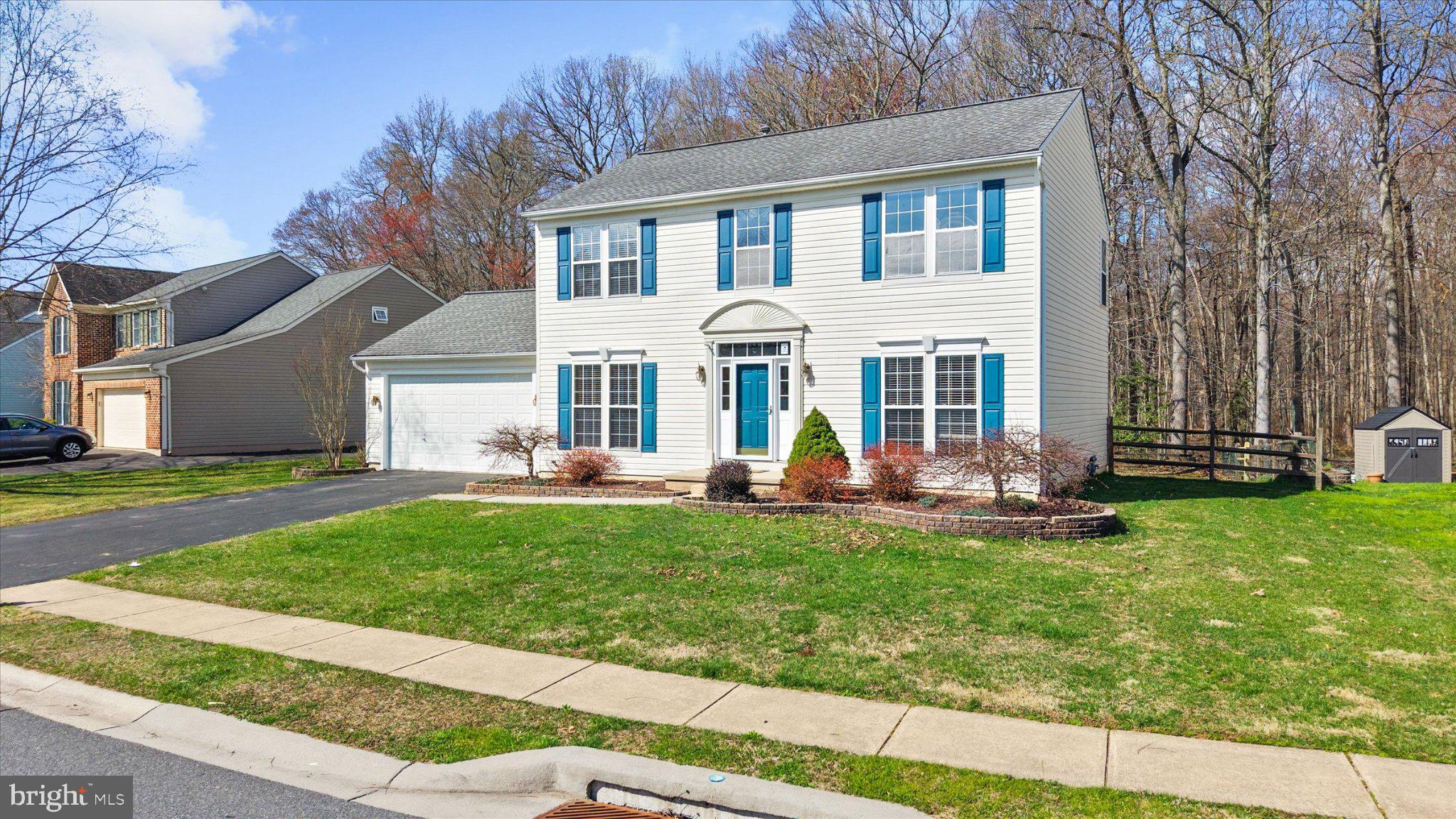 457 Preakness Run Newark, DE 19702 - Photo 3 of 55 a front view of a house with a yard